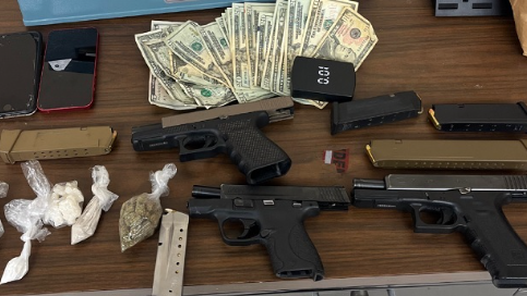 Suspect arrested on gun and drug charges in the Seventh District
