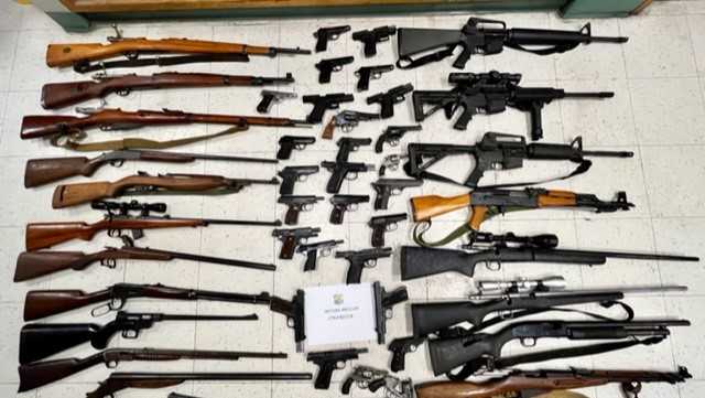 Police: 52 loaded firearms discovered at home of man accused of killing brother in Deer Park - Vimarsana News