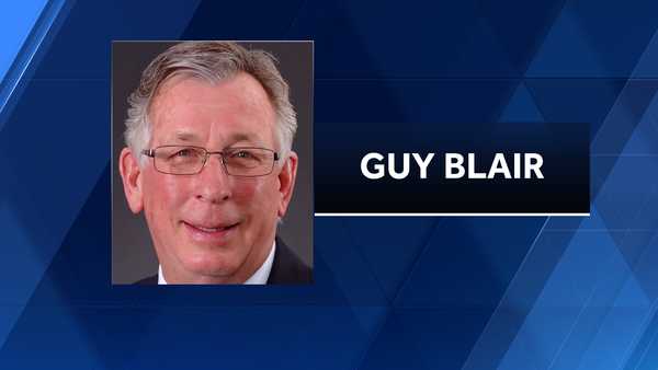 pella marching band honoring long-time band director during tulip time parade