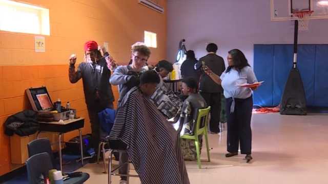 Local teacher and barber partner to bring free haircuts to academic scholars for Black History Month - Vimarsana News