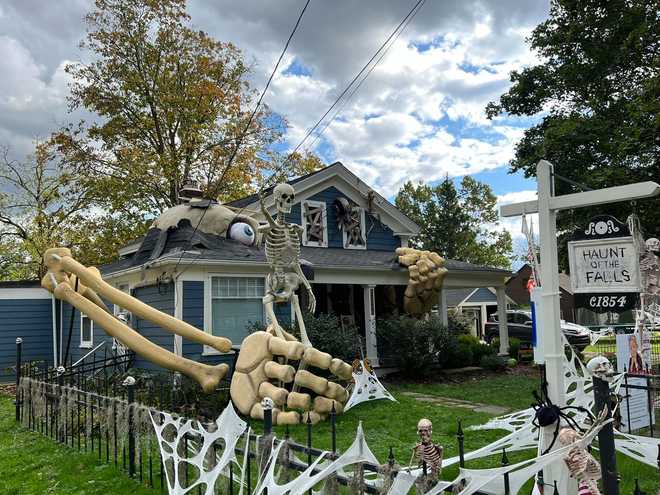 Man's Halloween display with massive skeleton goes viral