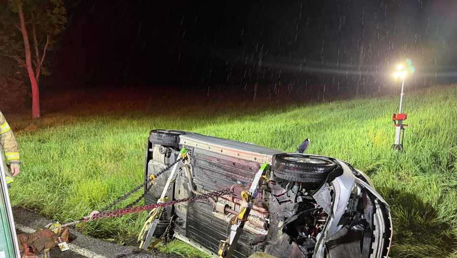 Crews rip roof off demolished car to free trapped person in Franklin ...