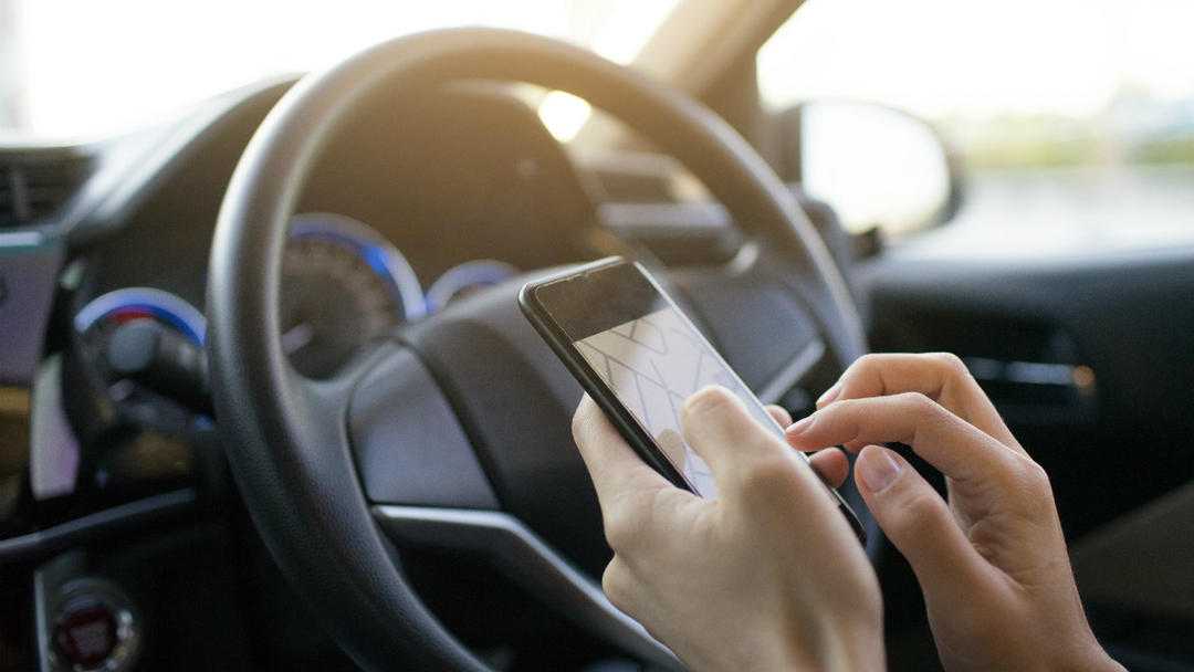 CA encouraged to ban hands-free devices while driving