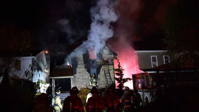 Firefighter Falls Through Floor Of Burning Home 9752