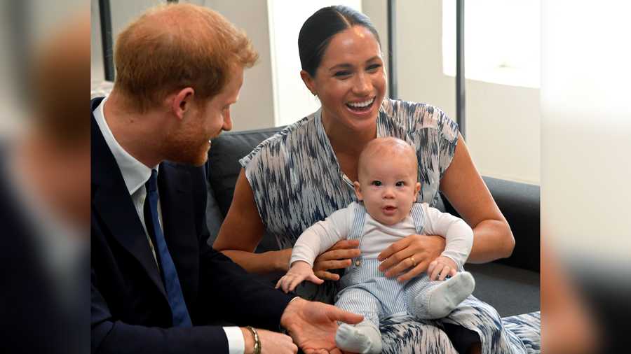 The image shows Meghan, Harry and their baby son Archie on Sept. 25, 2019 in Cape Town, South Africa.