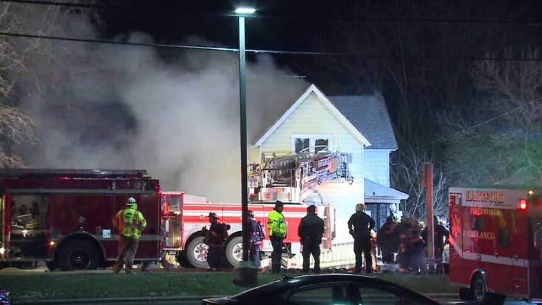 Fire Destroys Hartford House; Occupants Get Out Safely