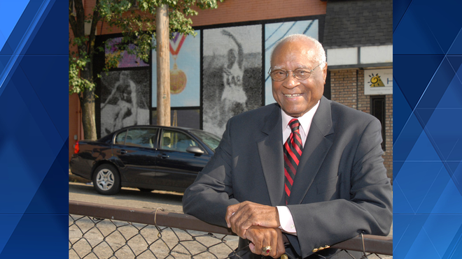 Herb&#x20;Douglas&#x20;stands&#x20;near&#x20;a&#x20;mural&#x20;of&#x20;his&#x20;image&#x20;in&#x20;Pittsburgh&#x27;s&#x20;Hazelwood&#x20;neighborhood.