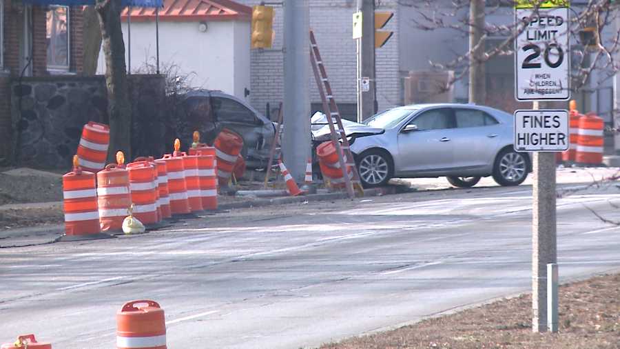 Driver hospitalized after being shot, crashing into light pole