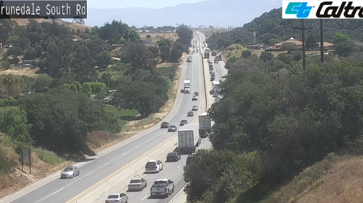 Overturned semitruck snarls traffic on southbound Highway 101 near
