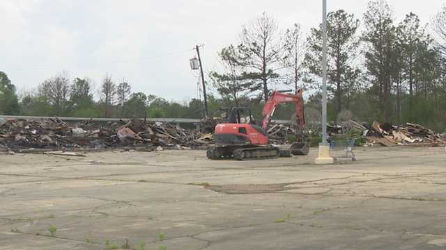 South Jackson building that burned months ago now being torn down - Vimarsana News