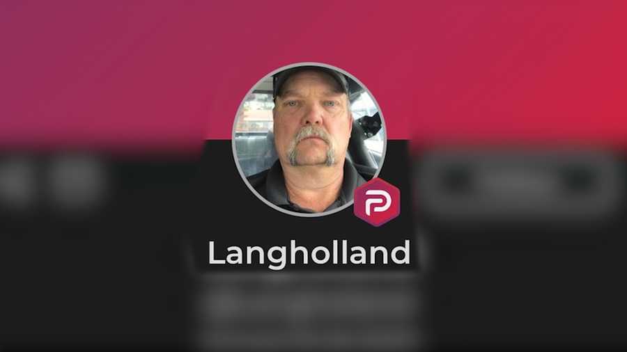 Lang Holland is the former police chief of Marshall, Arkansas. This image is from a Parler account in his name.