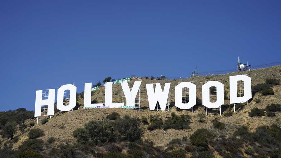 FILE - The Hollywood sign is pictured on Sept. 29, 2022, in Los Angeles. The Hollywood sign is getting a makeover befitting its status as a Tinseltown icon. After a pressure-wash and some rust removal, workers this week began using 250 gallons of primer and white paint to spruce up the sign ahead of its centennial next year. (AP Photo/Chris Pizzello, File)