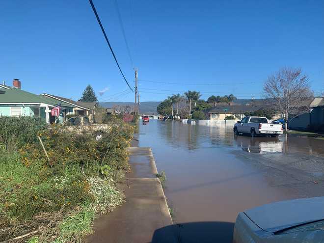watsonville-muck-out-floodwaters-following-breach-of-corralitos-creek