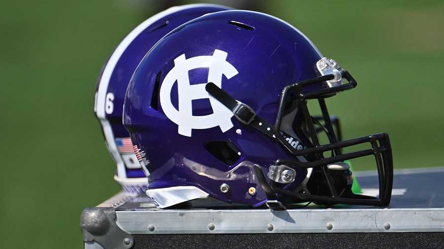 A Holy Cross Crusaders helmet on the sidelines during a game against the Yale Bulldogs on September 18, 2021, at the Yale Bowl in New Haven, Connecticut. (Icon Sportswire via Getty Images)