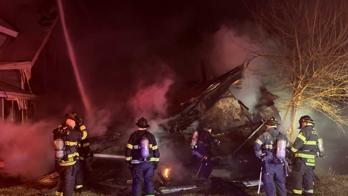 Neighbors report explosion as Kansas City home catches fire