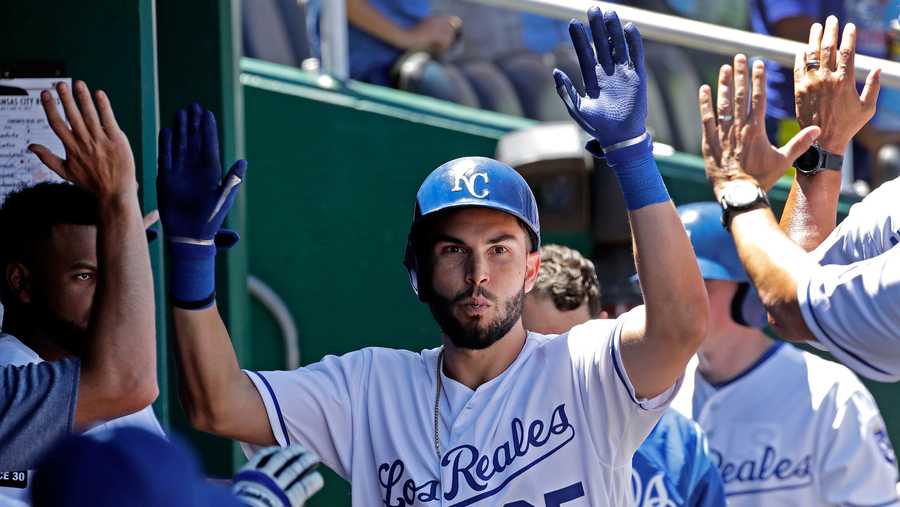 Kansas City Royals' Eric Hosmer celebrates in the dugout after hitting a solo home run during the fourth inning of a baseball game against the Toronto Blue Jays Saturday, June 24, 2017, in Kansas City, Mo. (AP Photo/Charlie Riedel)