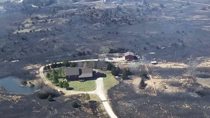 Fire crews saved a home near Hutchinson, Kansas, from the wildfires.