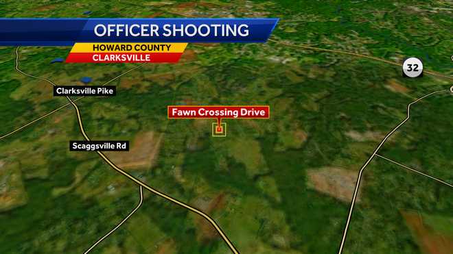 Officer nearly struck by car shoots wanted suspect