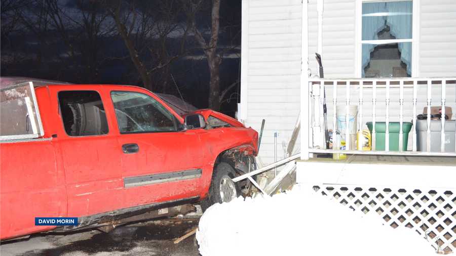 Hudson man charged after striking house with pickup truck