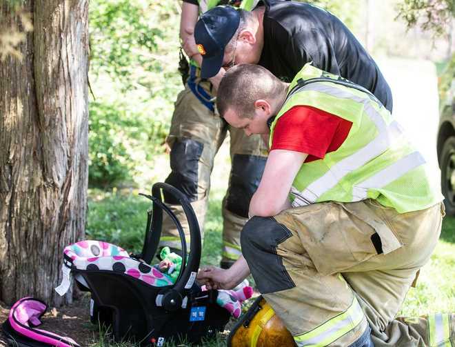 Chase Woman tries to flee with baby in car seat, police say