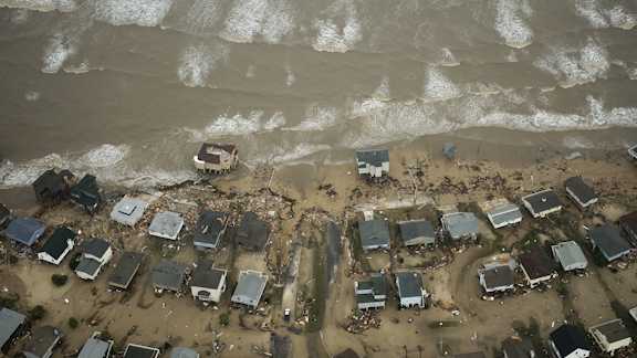 In this aerial photo, damaged beach front homes are seen on Galveston Island after the passing of Hurricane Ike September 13, 2008 in Galveston, Texas.