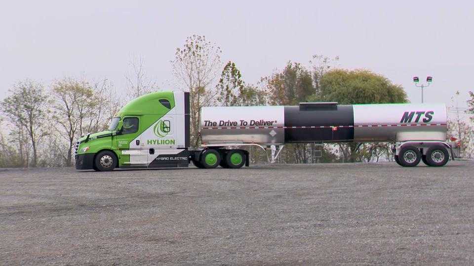 Trucking company seeks to help set standard with hybrid big rigs