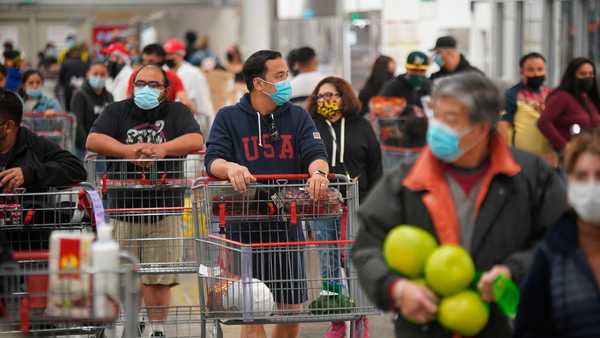 People wearing face masks are seen shopping at a Costco store. (Photo by Michael Ho Wai Lee / SOPA Images/Sipa USA)(Sipa via AP Images)