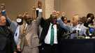 Philonise Floyd, Attorney Ben Crump, and Reverend Al Sharpton react following the verdict in the trial of former police officer Derek Chauvin in Minneapolis, Minnesota on April 20, 2021.