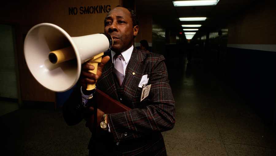 Joe Clark, principal of Eastside High School in Patterson, New Jersey, poses for a photo in the school hallways in February of 1988 in Paterson New Jersey.