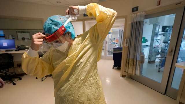 US coronavirus surge could peak later this month, expert says, but the next few weeks are critical - Vimarsana News