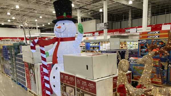 Christmas decorations sit on display for sale in a Costco warehouse Monday, Aug. 29, 2022, in Sheridan, Colo. (AP Photo/David Zalubowski)