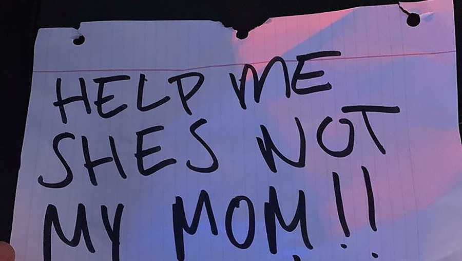Officers in California pulled over a car after people spotted a girl holding up this note.
