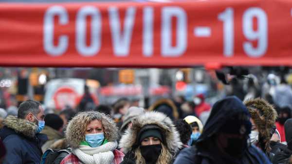 Photo by: NDZ/STAR MAX/IPx 2021 12/27/21 People wait in line for COVID-19 tests at a mobile testing site in Times Square on Dec. 27, 2021 in New York.