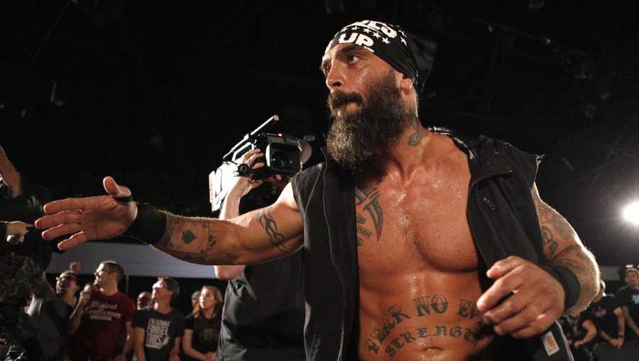 Oct 15, 2016; Dearborn, MI, USA; Jay Briscoe greets the fans as he enters during the ninth match at Ford Community and Performing Arts Center. Mandatory Credit: Raj Mehta-USA TODAY Sports