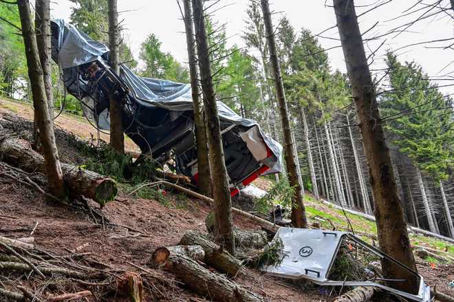 The&#x20;cabin&#x27;s&#x20;wreckage&#x20;covered&#x20;with&#x20;a&#x20;tarpaulin&#x20;on&#x20;Wednesday.