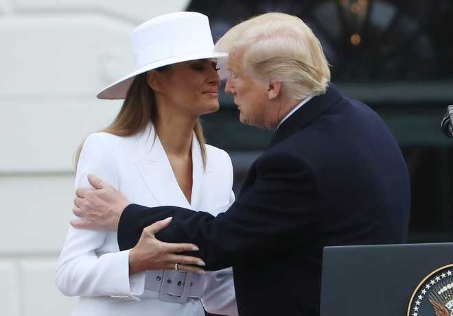 WASHINGTON,&#x20;DC&#x20;-&#x20;APRIL&#x20;24&#x3A;&#x20;&#x20;U.S&#x20;President&#x20;Donald&#x20;Trump,&#x20;kisses&#x20;U.S.&#x20;first&#x20;lady&#x20;Melania&#x20;during&#x20;an&#x20;arrivalceremony&#x20;for&#x20;French&#x20;President&#x20;Emmanuel&#x20;Macron,&#x20;French&#x20;first&#x20;lady&#x20;Brigitte&#x20;Macron,&#x20;at&#x20;the&#x20;White&#x20;House&#x20;April&#x20;24,&#x20;2018&#x20;in&#x20;Washington,&#x20;DC.&#x20;Trump&#x20;is&#x20;hosting&#x20;Macron&#x20;for&#x20;a&#x20;two-day&#x20;official&#x20;visit&#x20;that&#x20;includes&#x20;dinner&#x20;at&#x20;George&#x20;Washington&#x27;s&#x20;Mount&#x20;Vernon,&#x20;a&#x20;tree&#x20;planting&#x20;on&#x20;the&#x20;White&#x20;House&#x20;South&#x20;Lawn&#x20;and&#x20;a&#x20;joint&#x20;news&#x20;conference.