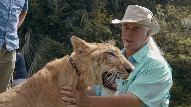 Bhagavan"Doc"Antle, who appeared in the 2020 docuseries"tiger king, "and four others have been charged on 10 counts of wildlife trafficking and money laundering charges.