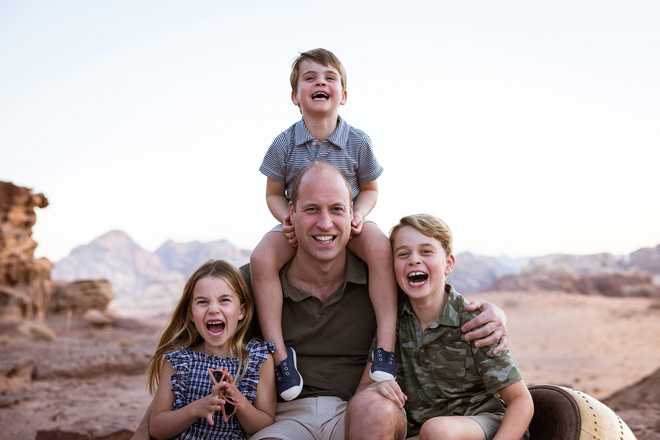 A handout photo of Britain's Prince William with Princess Charlotte, Prince  Louis and Prince George taken in Jordan in the Autumn of 2021.  Duke and Duchess of Cambridge/Kensington Palace/Handout via REUTERS THIS IMAGE HAS  x20;BEEN SUPPLIED BY A THIRD PARTY. MANDATORY CREDIT. NO RESALES. NO  x20;ARCHIVES. NO COMMERCIAL OR BOOK SALES. NOT FOR USE AFTER 31  DECEMBER 2022, WITHOUT PRIOR PERMISSION FROM KENSINGTON PALACE. NEWS EDITORIAL USE ONLY.  NO COMMERCIAL USE. NO MERCHANDISING, ADVERTISING, SOUVENIRS, MEMORABILIA or COLOURABLY  x20;SIMILAR. The photographer shall be solely us  ed for news editorial purposes only. It shall not be approved for  memories, or memorabilia; or anything colourably similar. No charge should be be  x20;made for the supply, release or publication of the photograph. There  shall be no commercial use whatsoever of the photographer (including by way  x20;of example only) any use in merchandising, advertising or any other  x20;non- news editorial use. The photographer must not be digitally enhanced,  x20;manipulated or modified in any manner or form and must include all  of the individuals in the photograph when published.