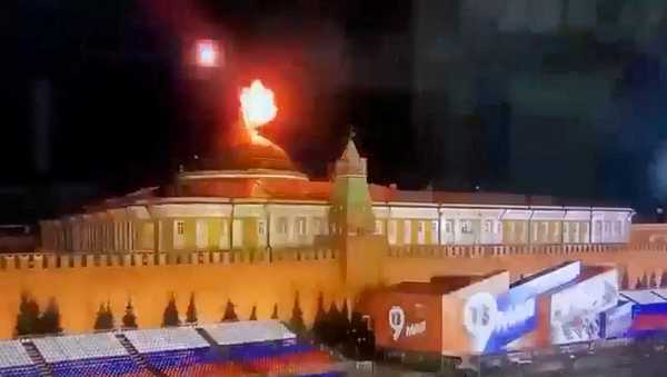 A still image taken from video shows a flying object exploding in an intense burst of light near the dome of the Kremlin Senate building during the alleged Ukrainian drone attack in Moscow, Russia, in this image taken from video obtained by Reuters May 3, 2023. Ostorozhno Novosti/Handout via REUTERS ATTENTION EDITORS - THIS IMAGE WAS PROVIDED BY A THIRD PARTY. NO RESALES. NO ARCHIVES. MANDATORY CREDIT.     TPX IMAGES OF THE DAY