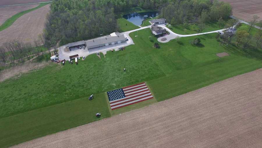 american flag painted in indiana field to honor heroes of pandemic