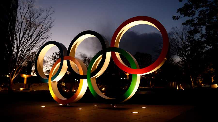 The Japanese government is determined to go ahead with the Tokyo Olympics, organizers said Friday. In this image, Olympic Rings are seen near the National Stadium, the main venue for the Tokyo 2020 Olympic and Paralympic Games, in Tokyo, Japan on Jan. 8, 2021. (BEHROUZ MEHRI/AFP/AFP via Getty)