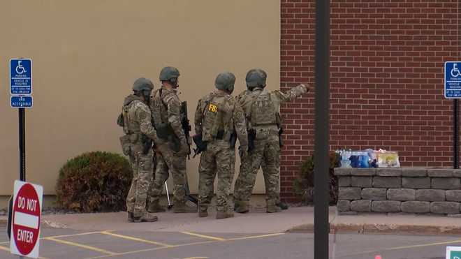 Authorities on scene of a hostage situation in St. Cloud, Minnesota, on Thursday, May 6, 2021.