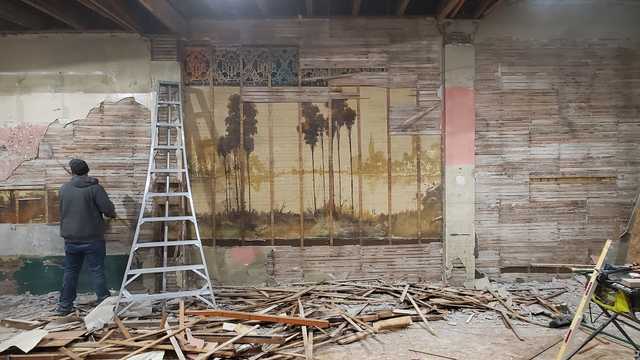 A couple renovating a 115-year-old building discovered two 60-foot-long hidden murals - Vimarsana News