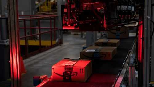 A package pass a scanner while moving along a conveyor at an Amazon.com Inc. fulfillment center in New Jersey, U.S., in June 2018. The USCPSC says Amazon is selling hazardous products to its customers. The federal safety watchdog is suing Amazon to stop.