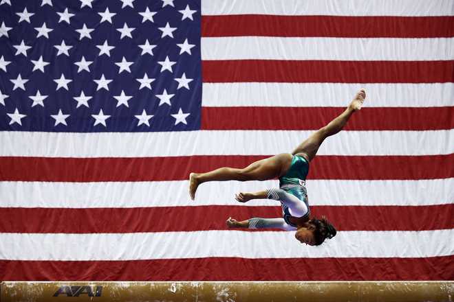 Simone&#x20;Biles&#x20;competes&#x20;on&#x20;the&#x20;balance&#x20;beam&#x20;during&#x20;the&#x20;Senior&#x20;Women&#x27;s&#x20;competition&#x20;of&#x20;the&#x20;2019&#x20;U.S.&#x20;Gymnastics&#x20;Championships&#x20;at&#x20;the&#x20;Sprint&#x20;Center&#x20;on&#x20;Aug.&#x20;9,&#x20;2019&#x20;in&#x20;Kansas&#x20;City,&#x20;Missouri.