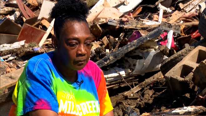 JoAnn&#x20;Winston&#x20;is&#x20;pictured&#x20;among&#x20;the&#x20;debris&#x20;after&#x20;a&#x20;tornado&#x20;struck&#x20;Silver&#x20;City,&#x20;Mississippi.