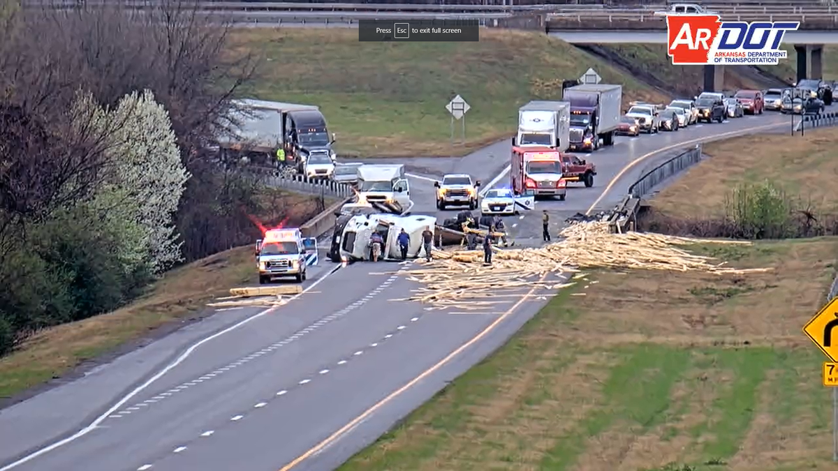 Get Ready Traffic: Semi carrying lumber rolls over, causing backup on I ...