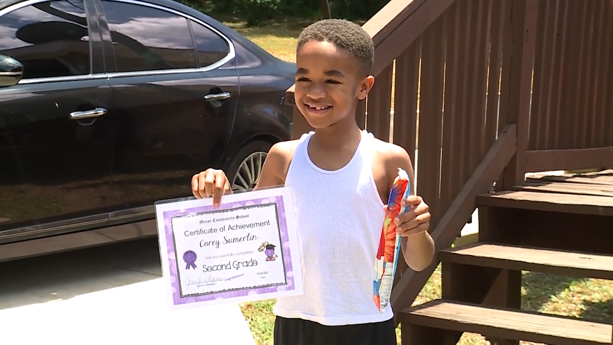 Minor Community School teacher Jennifer Higgins delivers ice cream