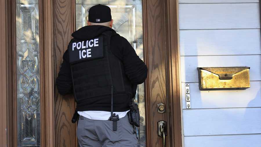 A Virginia police officer has been suspended after he turned over to immigration officials a driver who was wanted for skipping a deportation hearing, police said.