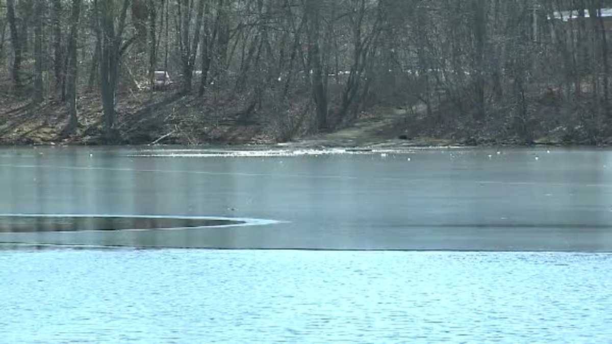 Man rescued trying to save boy from icy pond